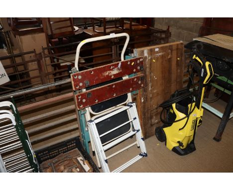 A workmate; a folding step ladder; and a clothes airer 
