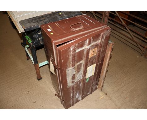 A large metal storage trunk