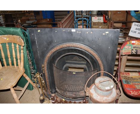 A cast iron fire grate and fire surround 