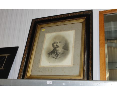 A black and white photographic print containing in ornate frame