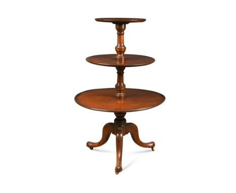 of three tiers, on a tripod base with brass casters (Dimensions: h: 115cm w: cm d: cm )(h:&nbsp;115cm w:&nbsp;cm d:&nbsp;cm )