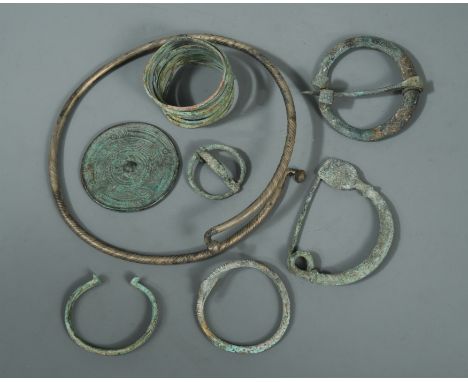 together with a group of Roman or Greek jewellery to include a spiral bracelet, a bangle with duck head finials, various torq