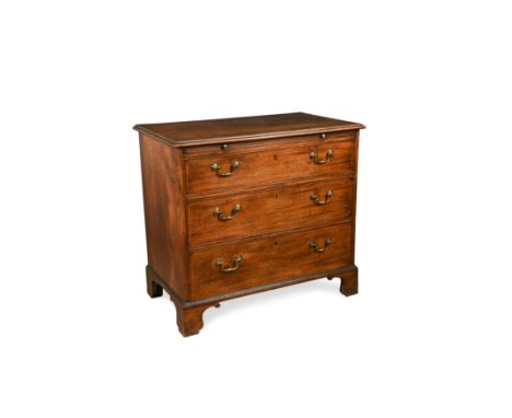 with a brushing slide and three long drawers, on bracket feet (Dimensions: h: 84cm w: 91cm d: 54cm )(h:&nbsp;84cm w:&nbsp;91c