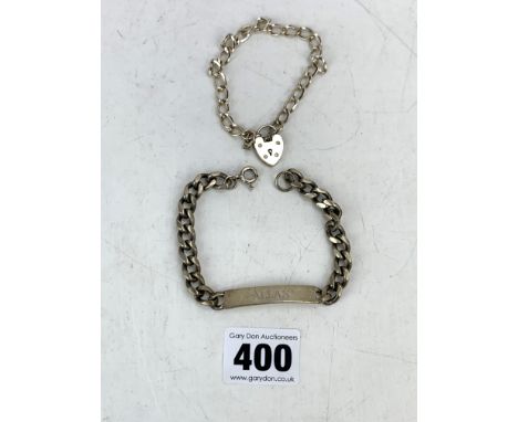Silver ID bracelet 7.5" long and silver gate bracelet with heart lock 7" long, total w: 1.1 ozt