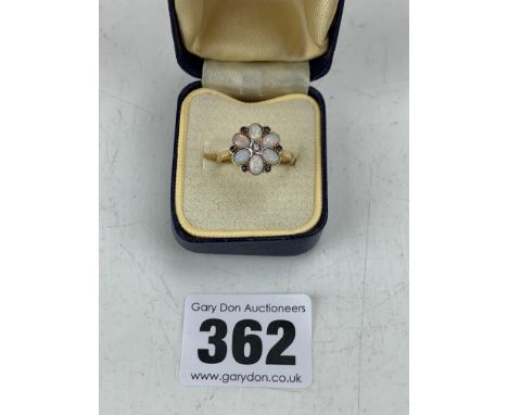 18k gold and platinum ring with opal cluster, size M, w: 2.6 gms