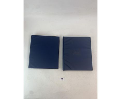 2 blue stamp albums of Commonwealth and world stamps