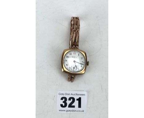 9k gold Waltham ladies watch with 9k gold elasticated bracelet strap, total w: 30.9 gms, not working