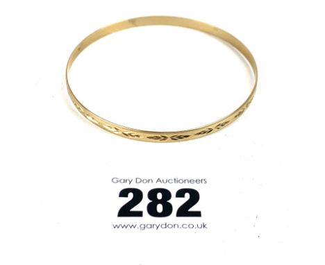 9k gold bangle, w: 6.9 gms