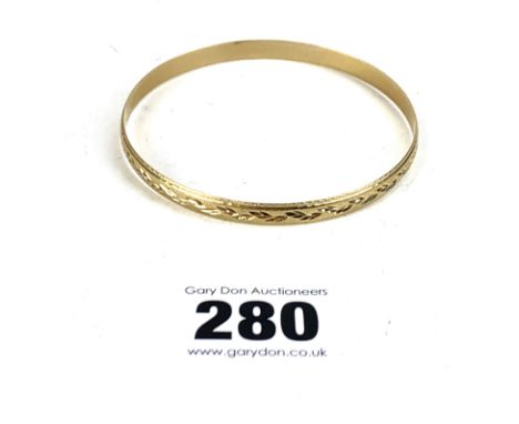 9k gold bangle, w: 9.5 gms