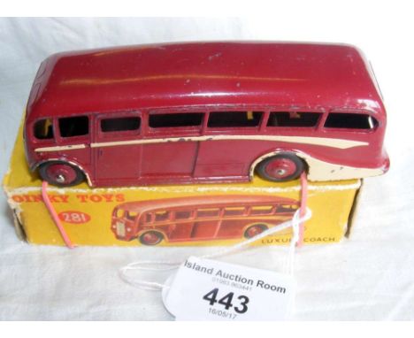 A boxed Dinky Toys No.281 Luxury Coach in maroon and cream