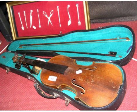 A violin in fitted carrying case, together with montage of carved ivory items