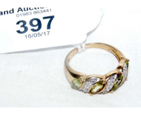 A 9ct gold peridot and diamond ring