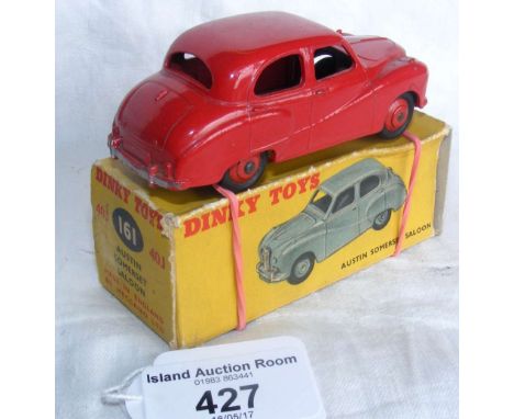 A boxed Dinky Toys No.161 Austin Somerset Saloon in red