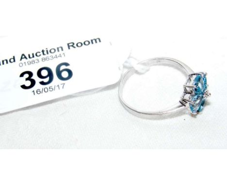 A 9ct white gold blue zircon cluster ring