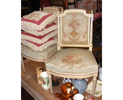 A pair of French salon chairs with tapestry seats and backrests