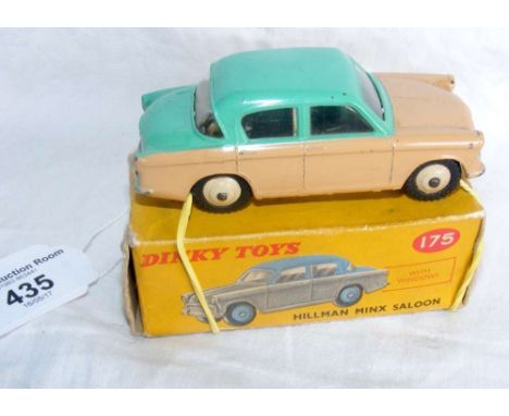 A boxed Dinky Toys No.175 Hillman Minx Saloon in fawn and green