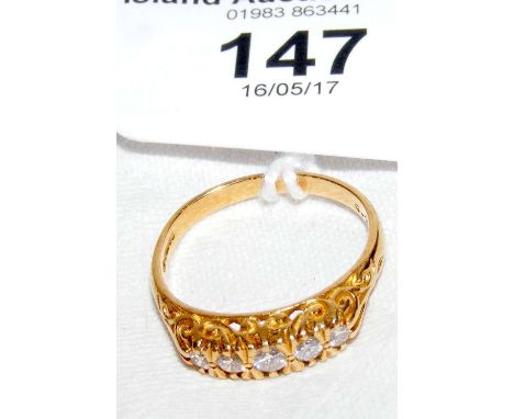 An 18ct gold five stone diamond ring