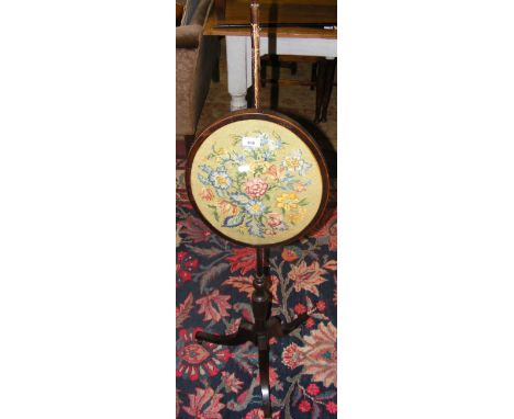 A 19th century oval pole screen