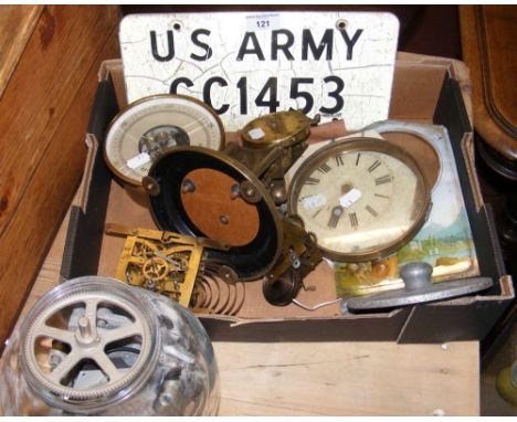 Various clock parts, old US Army number plate, etc.