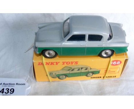 A Dinky Toys No.168 Singer Gazelle in grey and green in reproduction box