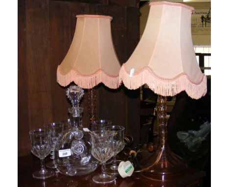 A pair of glass table lamps, together with decanter and glasses