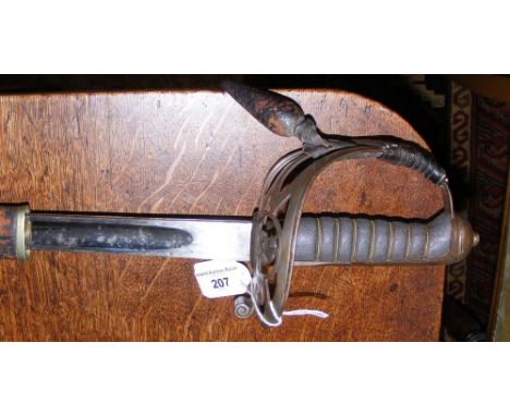 Antique Officer's sword in leather clad scabbard