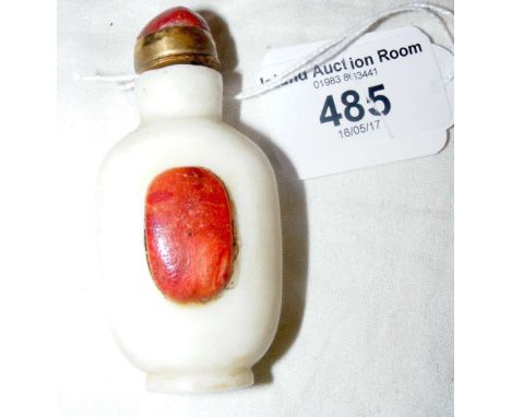 Antique ceramic milk glass Chinese snuff bottle with red coral top and copper spoon
