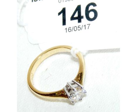 An 18ct gold single stone diamond ring