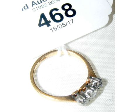 A three stone diamond ring in 18ct gold setting