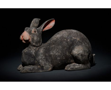 C. 206 BC - 220 AD. Han dynasty, A hollow-formed terracotta rabbit figurine with a black pelt and coral-pink pigmentation on 