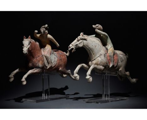 C. 618 - 907 AD. Chinese Tang Dynasty. An exquisite set of two ceramic female polo players. These two ceramics show two women