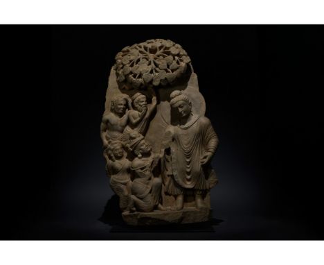 100-300 AD. Gandharan. Stunning carved schist stone panel fromGandhara representing Buddha and four attendees. Buddha is pres