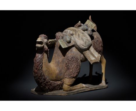 C. 618 - 907 AD. Chinese Tang Dynasty. A large and rare ceramic figurine of a Bactrian camel, also known as a Mongolian camel