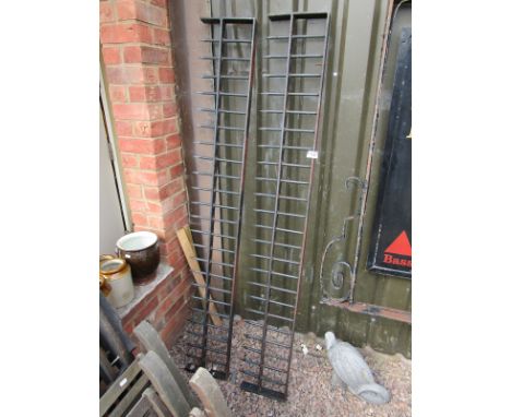 2 rails of heavy iron gate spikes