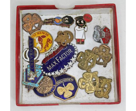 A box of collectable badges including Max Factor, Dodge, Butlins, automobile, Girl Guides etc. 