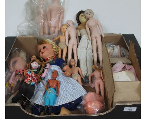 A box of vintage dolls, together with soft bodies for doll making. 
