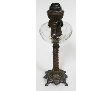 A brass and glass Matador oil lamp, height 36cm. 