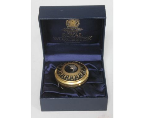 A Royal Worcester pill box/clock with box. 