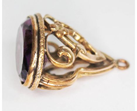 A yellow metal mounted amethyst fob. 