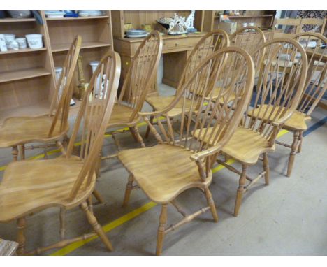 A Set of eight stick back chairs to include two carvers