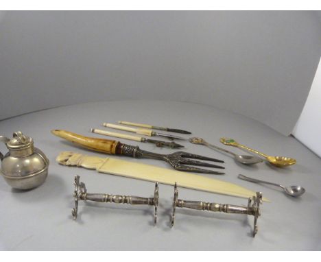 A small quantity of items to include knife rests, three novelty teaspoons carved serving form and a worked ivory letter opene