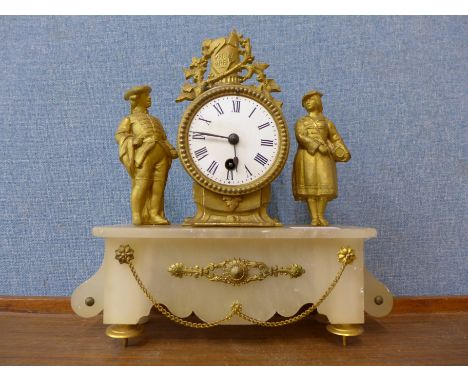 A 19th Century French gilt metal and alabaster mantel clock
