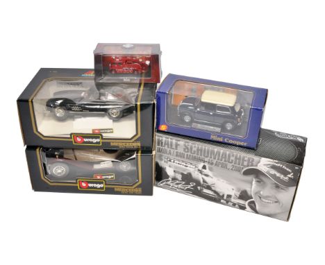 A mixed group of boxed die-cast model cars including Bburago Mercedes-Benz 300 SL and 540K, a Mini Cooper, a Ralf Schumacher 