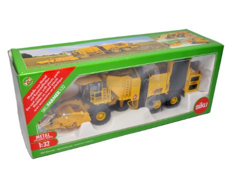 Siku 1/32 farm model issue comprising Ropa Euro Tiger Sugarbeet Harvester. Excellent in original box.