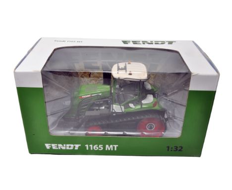 USK Scale Models 1/32 farm model issue comprising Fendt 1165 MT Tractor. Some signs of being displayed at some stage, but no 
