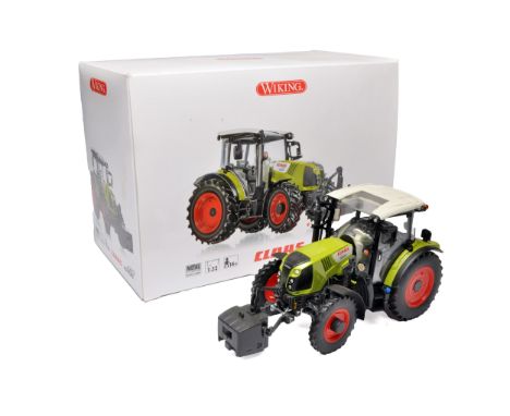 Wiking 1/32 farm model issue comprising Claas Arion 420 Tractor. Custom Wheels Fitted. Displayed but no obvious sign of fault