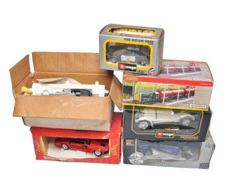 A mixed group of seven model vehicles and accessories, including Bburago die-cast cars such as a Ford Mustang Police, Mercede