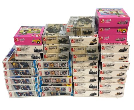 A group of boxed Sluban building sets, covering the Army, Girls Dream, and Car Club series. Models include a wide range of mi