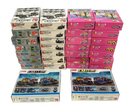 A group of boxed Sluban building sets, including models from the Army, Aviation, Girls Dream, and Car Club series. Features a