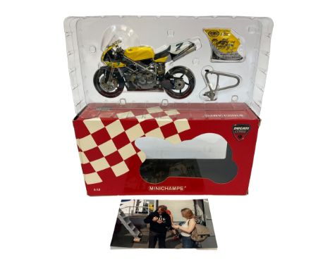 A Minichamps 1:12 scale die-cast model of the Ducati 998RS Superbike associated with Troy Corser. Includes a signed fairing p